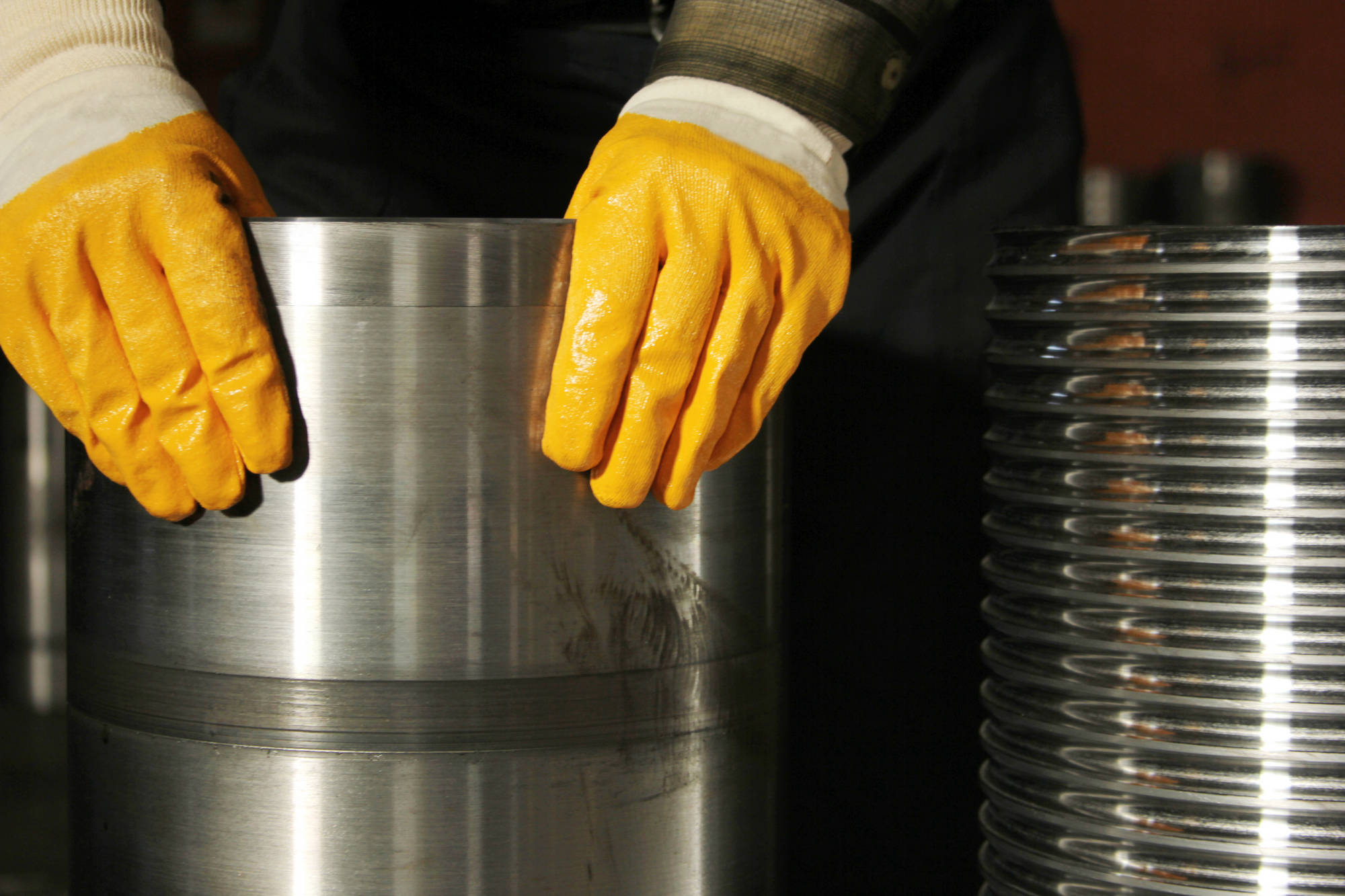 Worker And Steel Cylinder