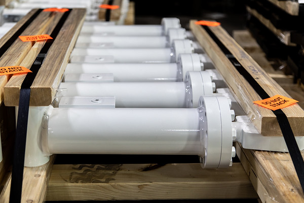 White painted hydraulic cylinders